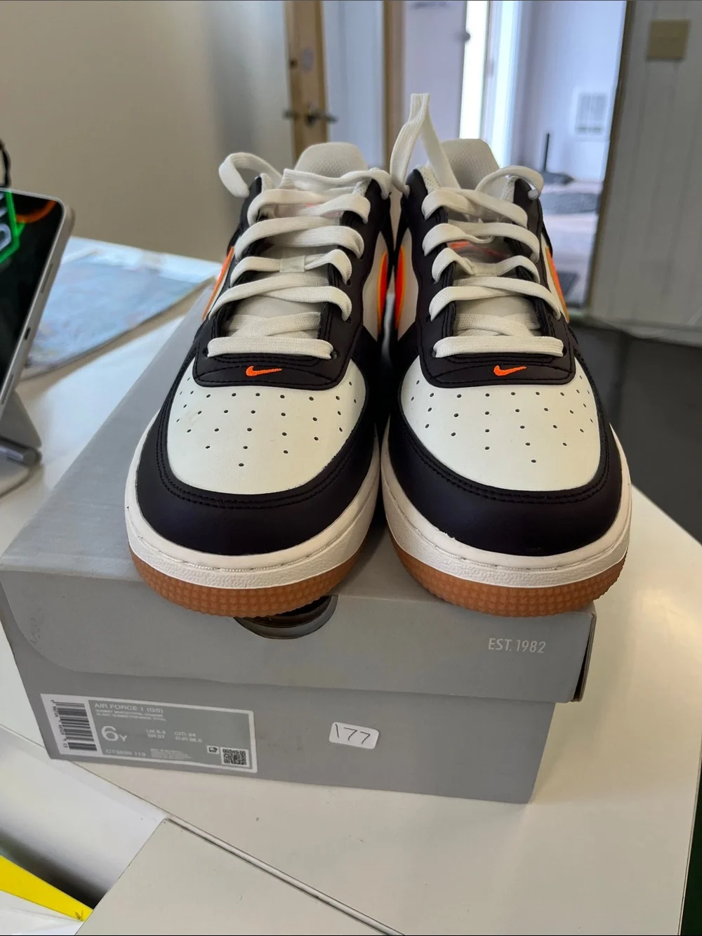 Nike Air Force 1’s Men’s Low-Top Sneakers - Black/White with Orange Swoosh